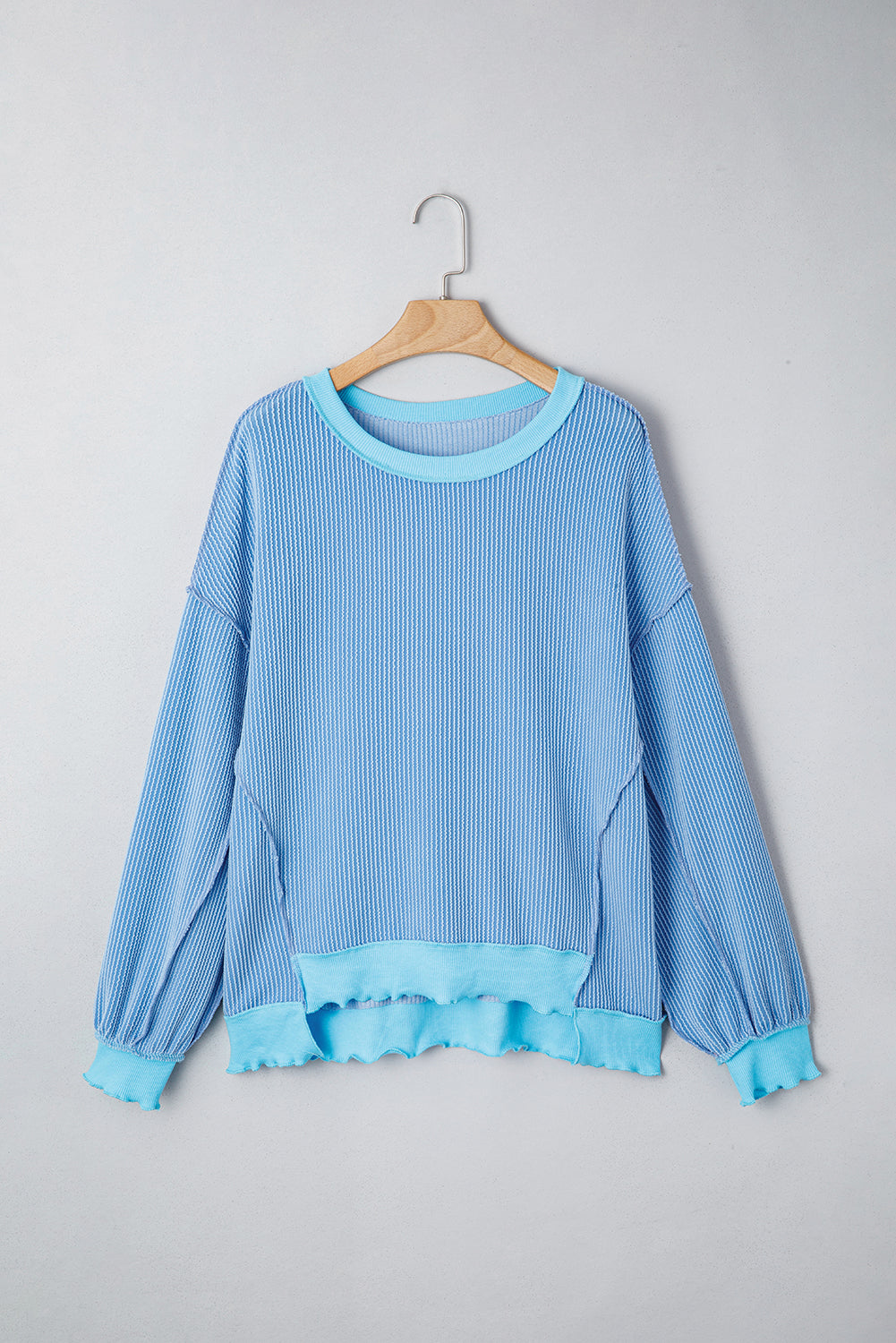 Twisted Rib Uneven Hem Drop Shoulder Loose Knit Top