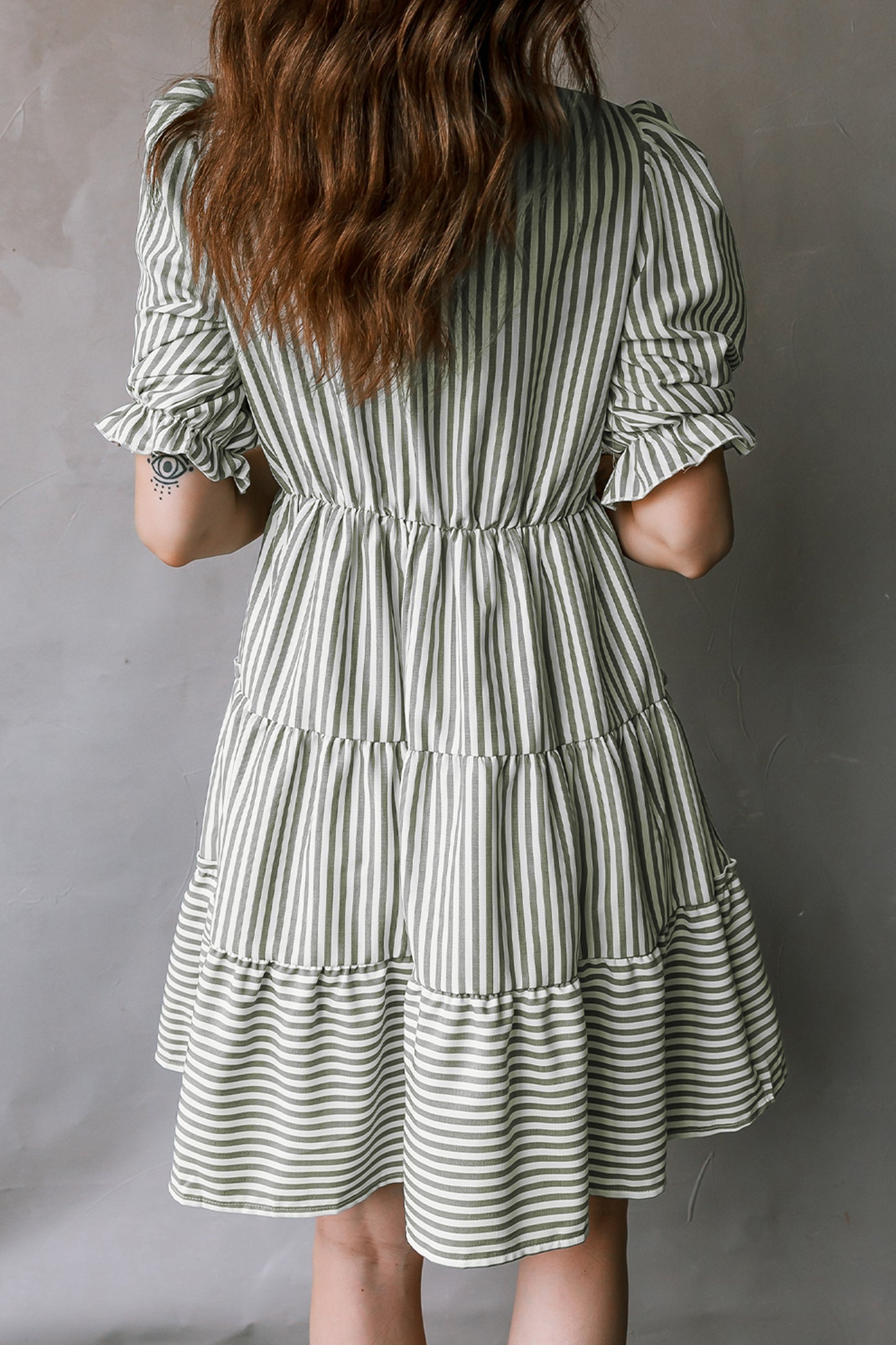 Striped Tasseled Tie Neck Ruffled Tiered Dress