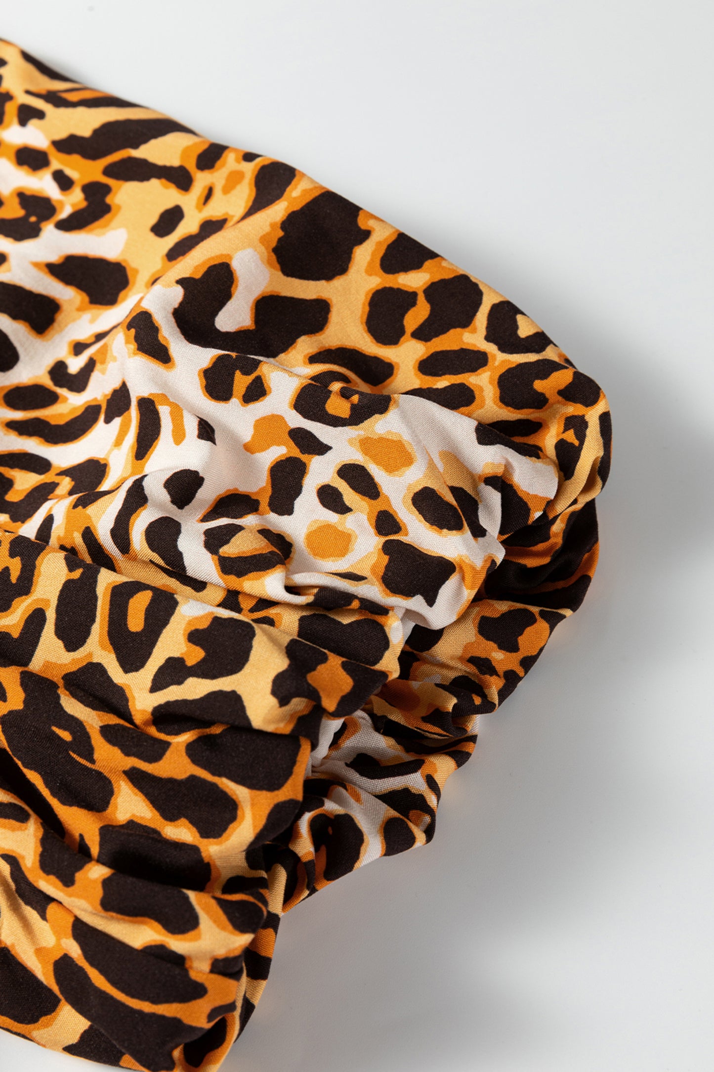 Leopard Print Short Puff Sleeve Slit Neck Babydoll Blouse