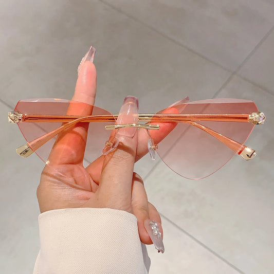 Women's Retro Metal Rimless Triangle Sunglasses