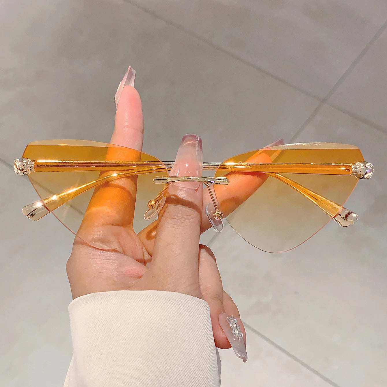 Women's Retro Metal Rimless Triangle Sunglasses