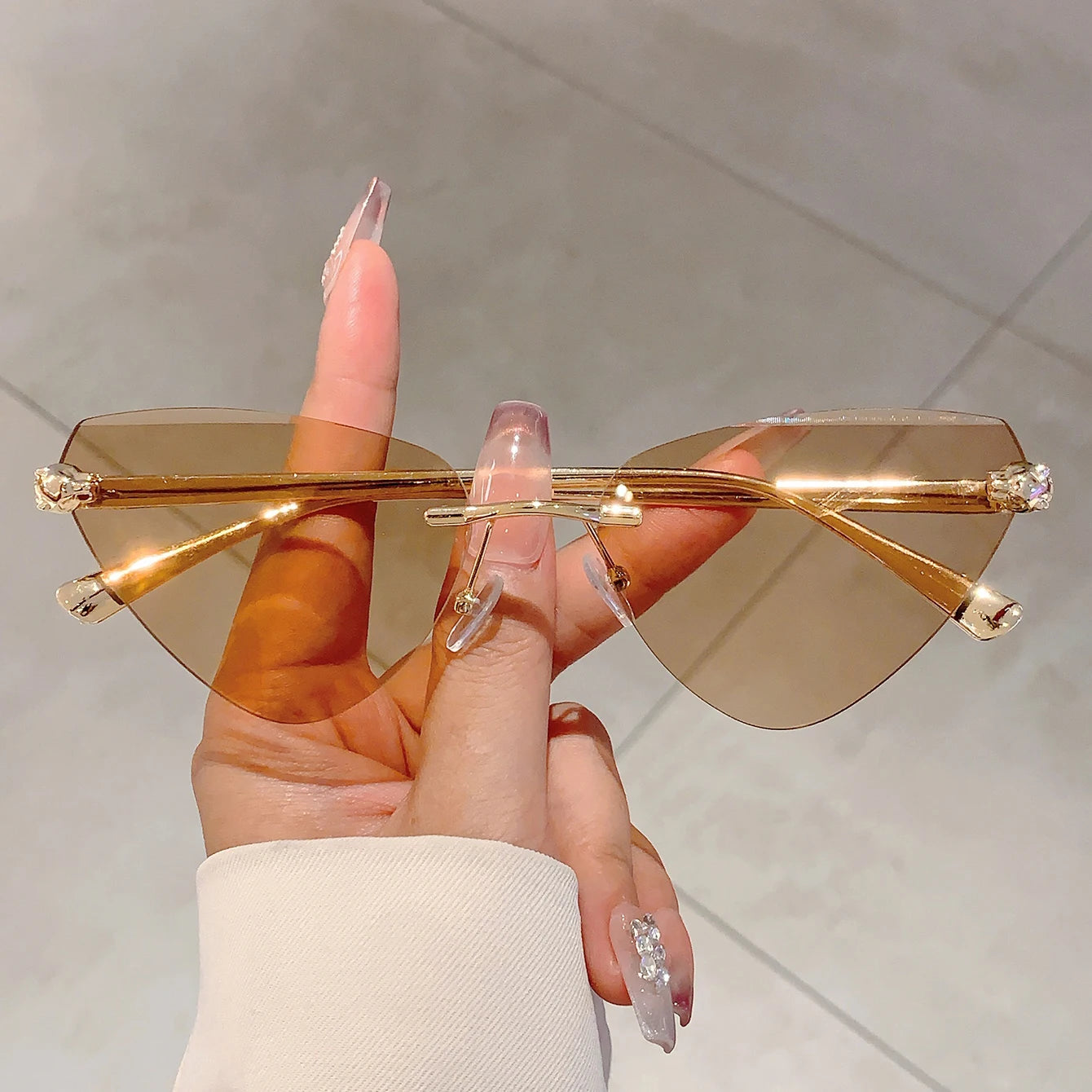 Women's Retro Metal Rimless Triangle Sunglasses