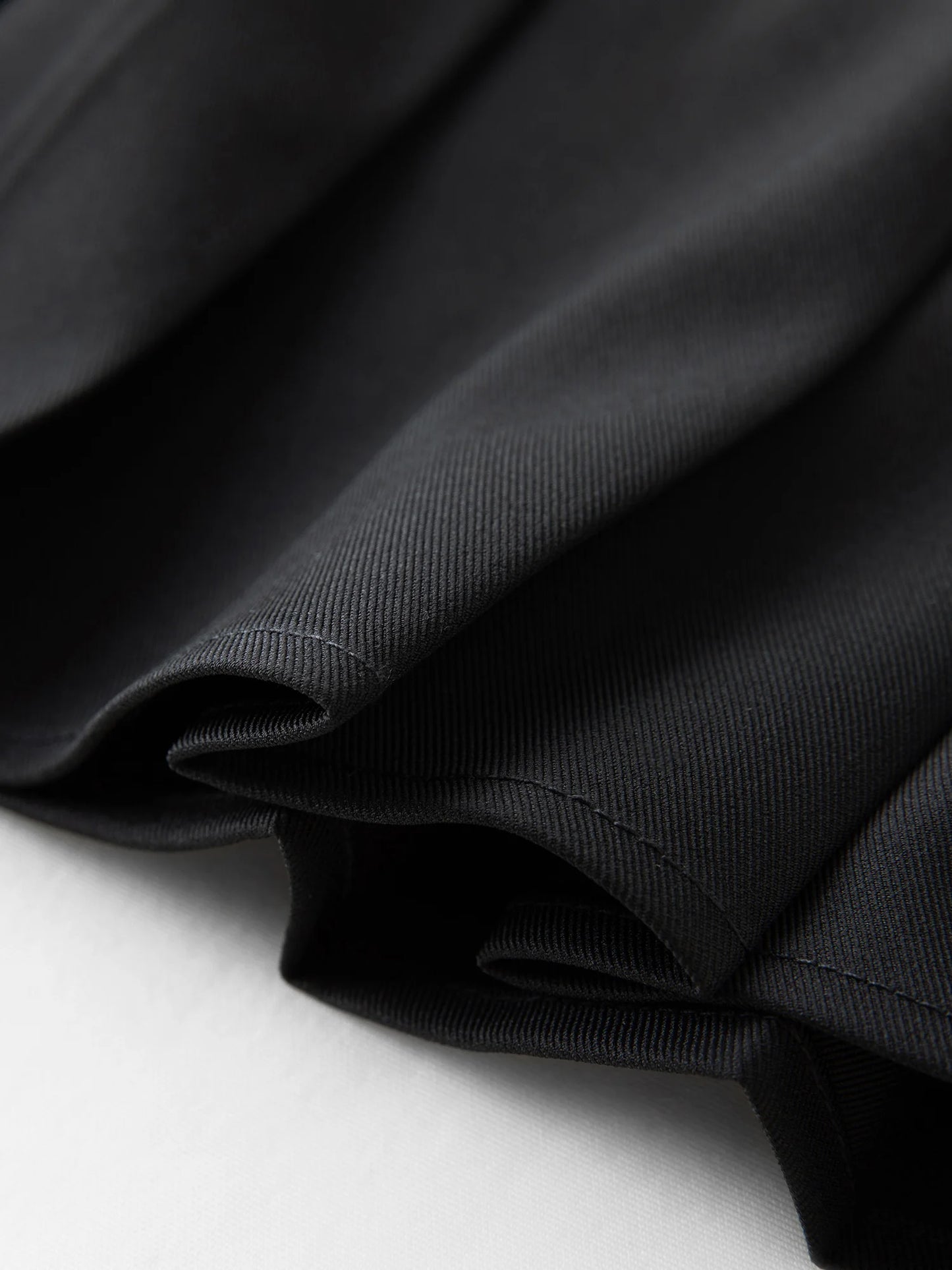 Ribbon Tie Blouse with Irregular Hem