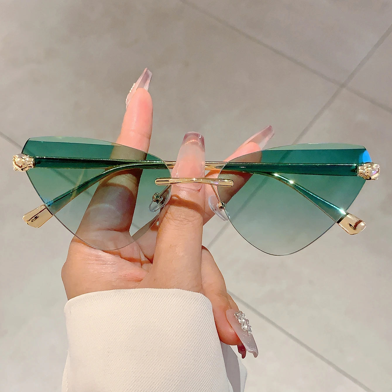 Women's Retro Metal Rimless Triangle Sunglasses